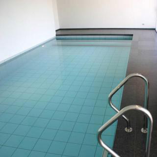 Indoor Schwimmbad Naturstein Granit Ahrensburg